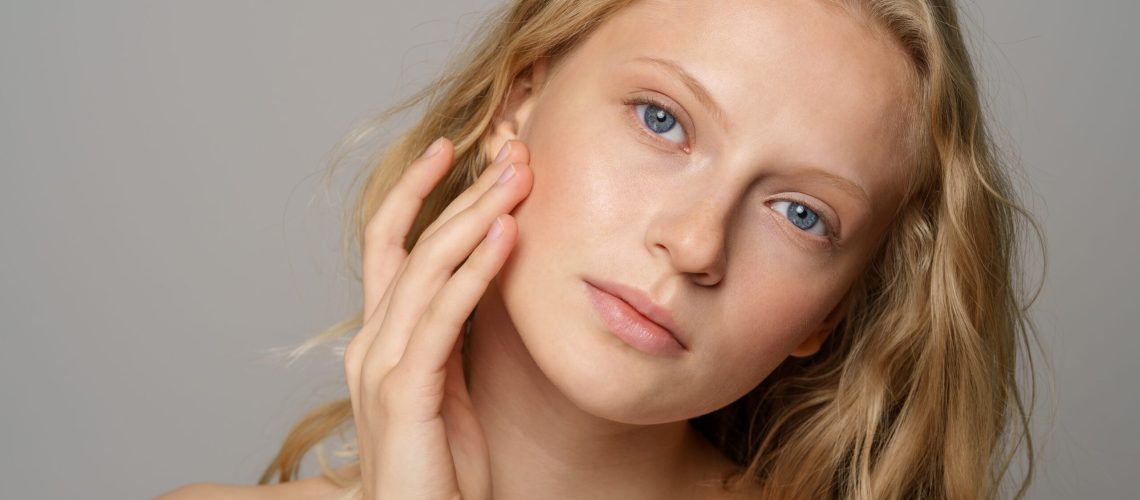 young-woman-face-with-blue-eyes-curly-natural-blo-2025-03-07-13-54-40-utc